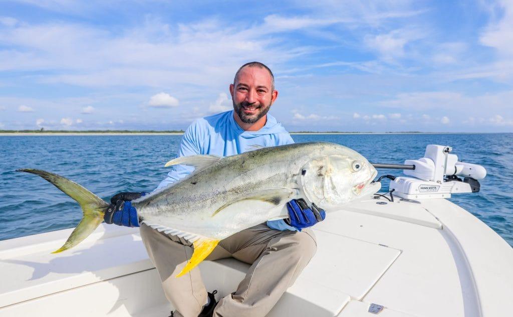 frank melloni with jack crevalle fish