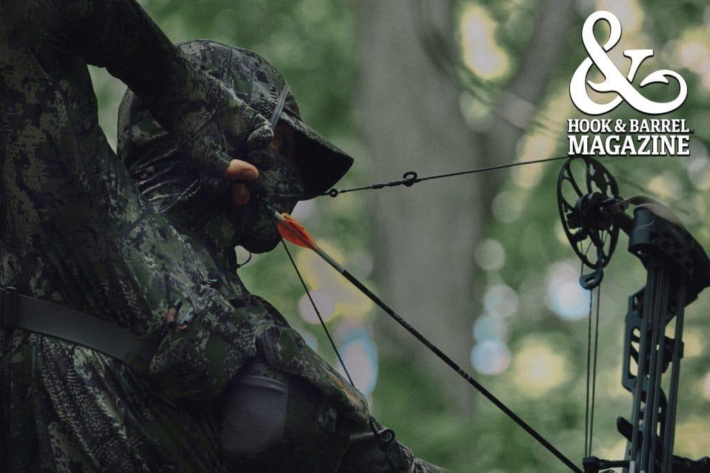 Sitka Optifade Cover bowhunter at full draw